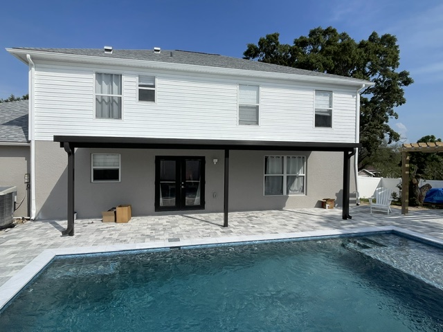 Insulated patio cover over pool deck