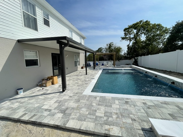 Insulated patio cover beside pool